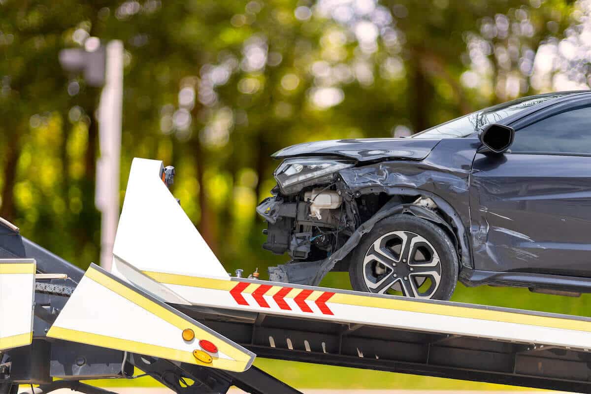 image showing car getting towed from car accident