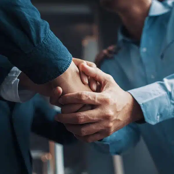 Client and attorney shaking hands